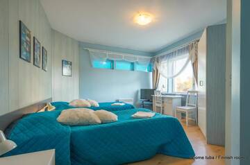 Фото номера Двухместный номер с 2 отдельными кроватями Отель Päeva Villa г. Хаапсалу 54