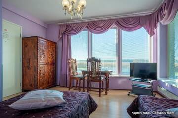 Фото номера Двухместный номер с 2 отдельными кроватями Отель Päeva Villa г. Хаапсалу 28