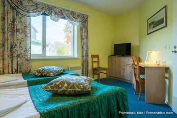 Фото номера Двухместный номер с 2 отдельными кроватями Отель Päeva Villa г. Хаапсалу 39