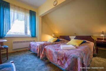 Фото номера Двухместный номер с 2 отдельными кроватями Отель Päeva Villa г. Хаапсалу 37