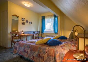 Фото номера Двухместный номер с 2 отдельными кроватями Отель Päeva Villa г. Хаапсалу 35