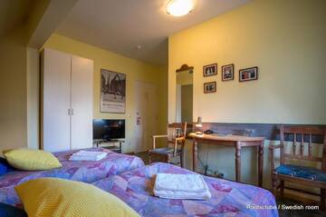 Фото номера Двухместный номер с 2 отдельными кроватями Отель Päeva Villa г. Хаапсалу 7